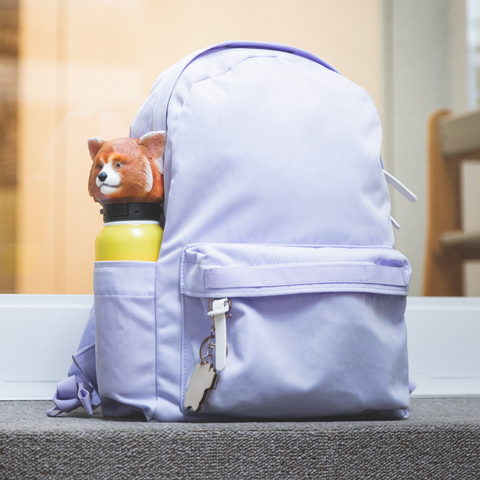 PIEK Red Panda Bottle with a backpack